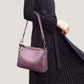 Fashionable shoulder bag with a crocodile print