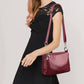 Fashionable shoulder bag with a crocodile print