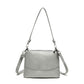 Fashionable shoulder bag with a crocodile print