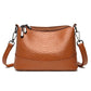 Fashionable shoulder bag with a crocodile print