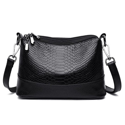 Fashionable shoulder bag with a crocodile print