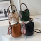 Woven textured leather bucket bag for women